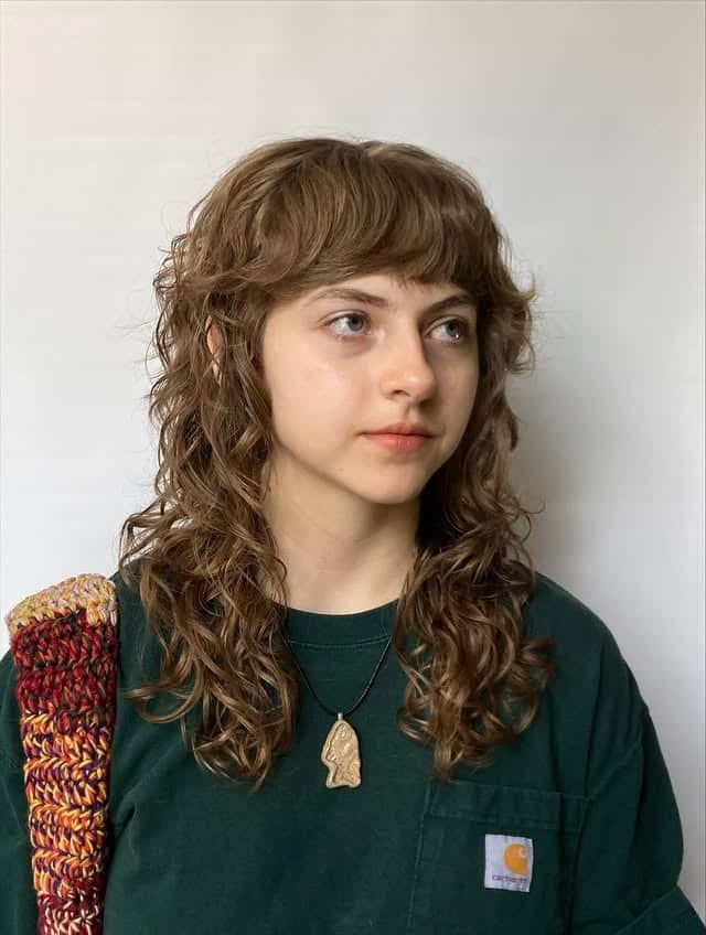 12. Light Brown Curly Shag with Soft Fringe - Shaggy Haircuts