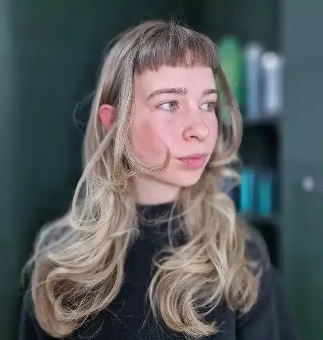 14. Platinum Blonde Shag with Micro Bangs - Shaggy Haircuts