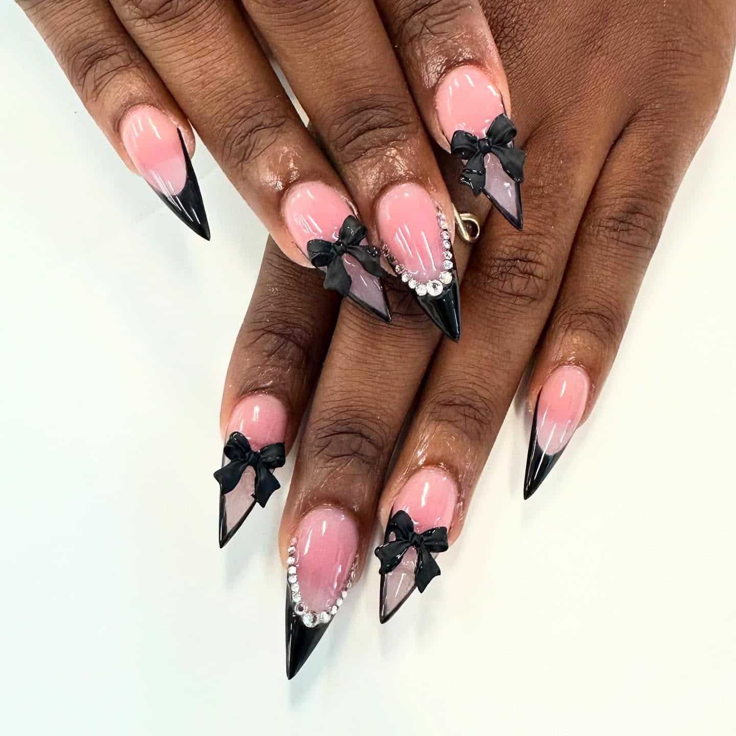 1. Black French Tip Bow Stiletto Nails - cool nail ideas