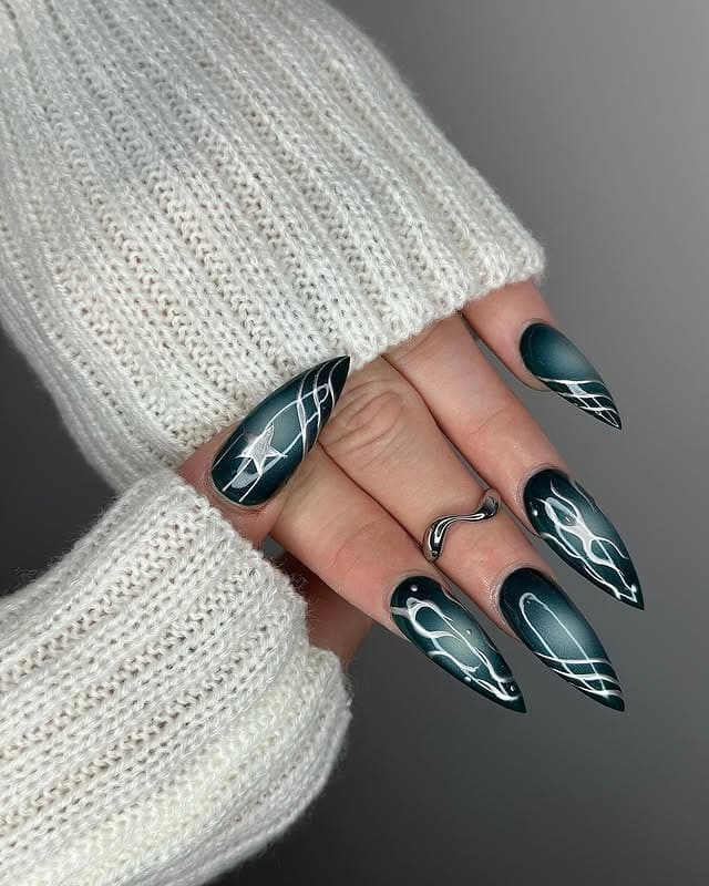 11. Emerald Green Abstract Almond Nails - cool nail ideas