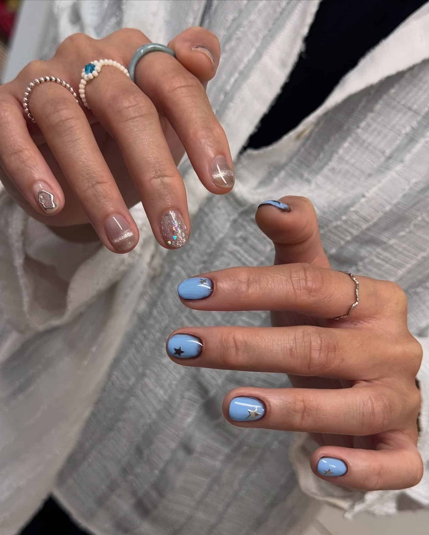 17. Baby Blue Star Short Nails - cool nail ideas