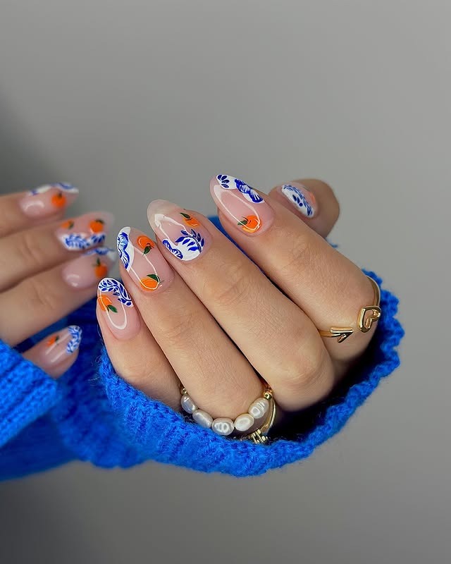 19. Blue and Orange Botanical Almond Nails - cool nail ideas