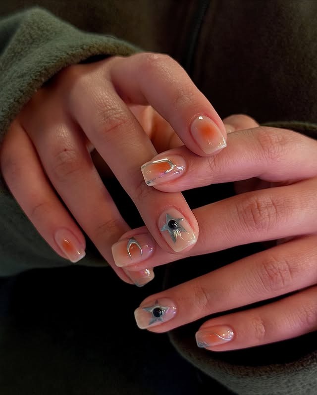 21. Sheer Peach Celestial Short Nails - cool nail ideas