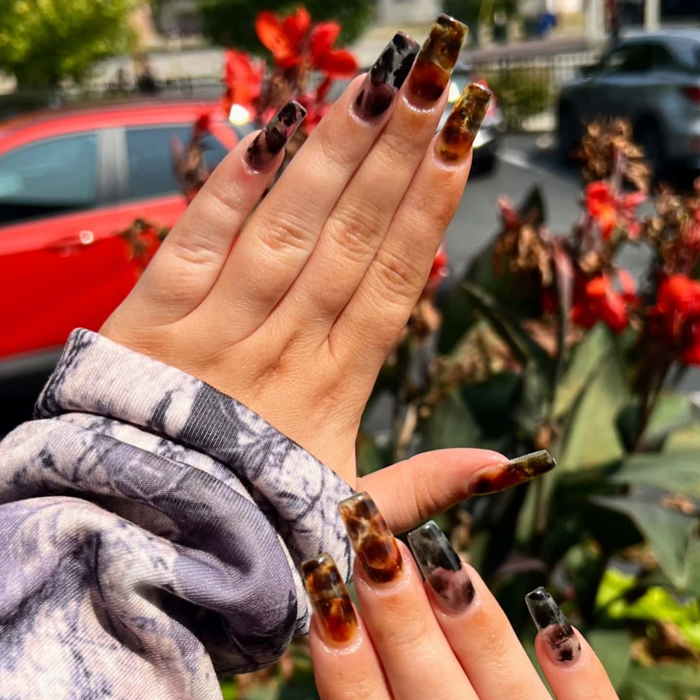 1. Brown and Black Tortoiseshell Coffin Dip Nails - dip nail ideas