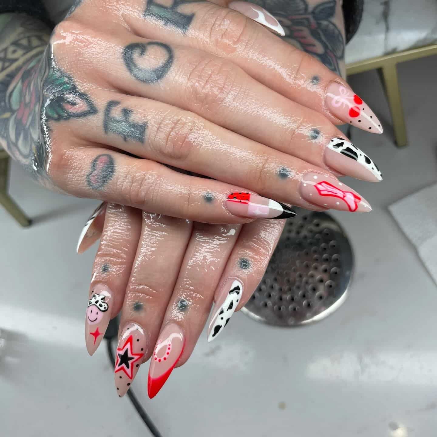 9. Red and Black Graphic Stiletto Dip Nails - dip nail ideas