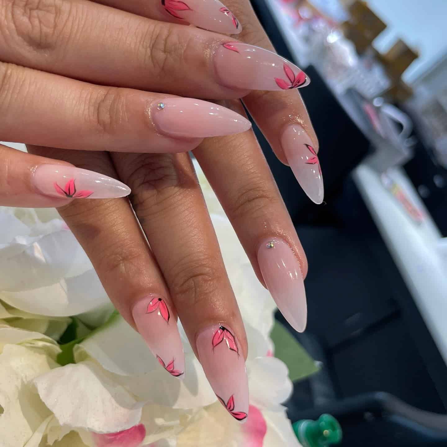 16. Pink Floral Almond Dip Nails - dip nail ideas