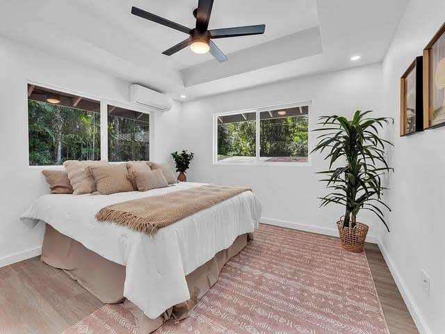 2. Soft Coastal Hawaiian Bedroom in Blush Pink and White - hawaiian bedroom ideas