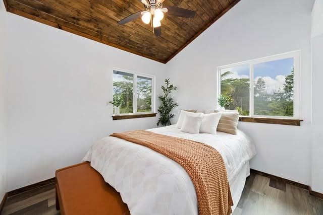 8. Vaulted Hawaiian Bedroom with Cinnamon Wood and Crisp White Layers - hawaiian bedroom ideas