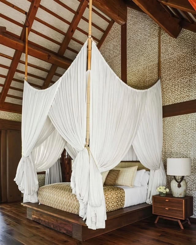 9. Luxury Canopy Hawaiian Bedroom in Cream and Walnut Tones - hawaiian bedroom ideas