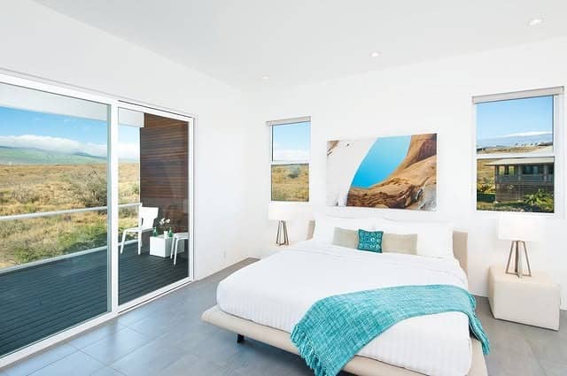 10. Contemporary Hawaiian Bedroom with Aqua Blue and Bright White Accents - hawaiian bedroom ideas