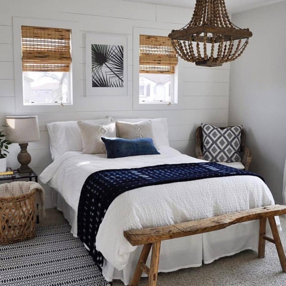 19. Modern Hawaiian Farmhouse Bedroom in Navy Blue and White - hawaiian bedroom ideas