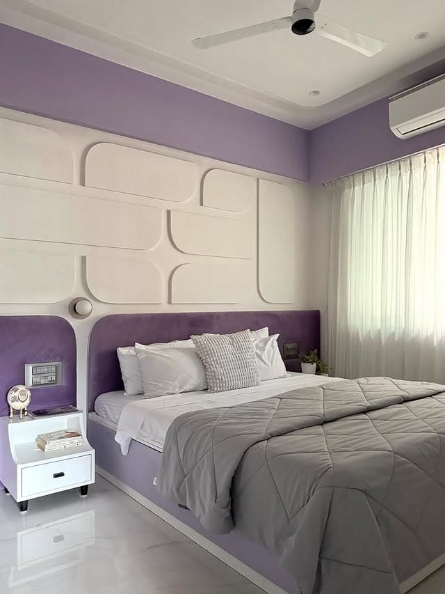 12. Modern Lavender Bedroom with Geometric Wall Panel Design - lavender bedroom ideas