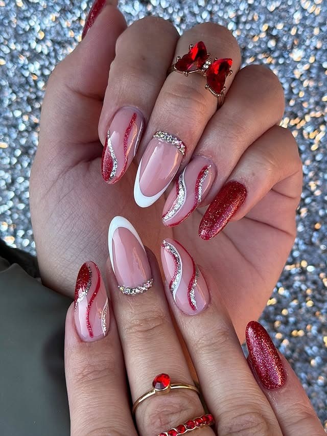 1. Ruby Red Glitter Swirl Almond Nails - elegant nail ideas