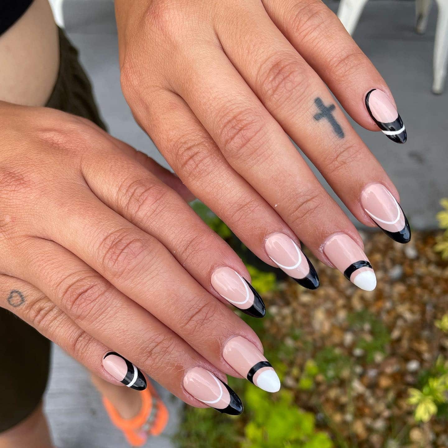 7. Modern Black and White Graphic Almond Nails - elegant nail ideas