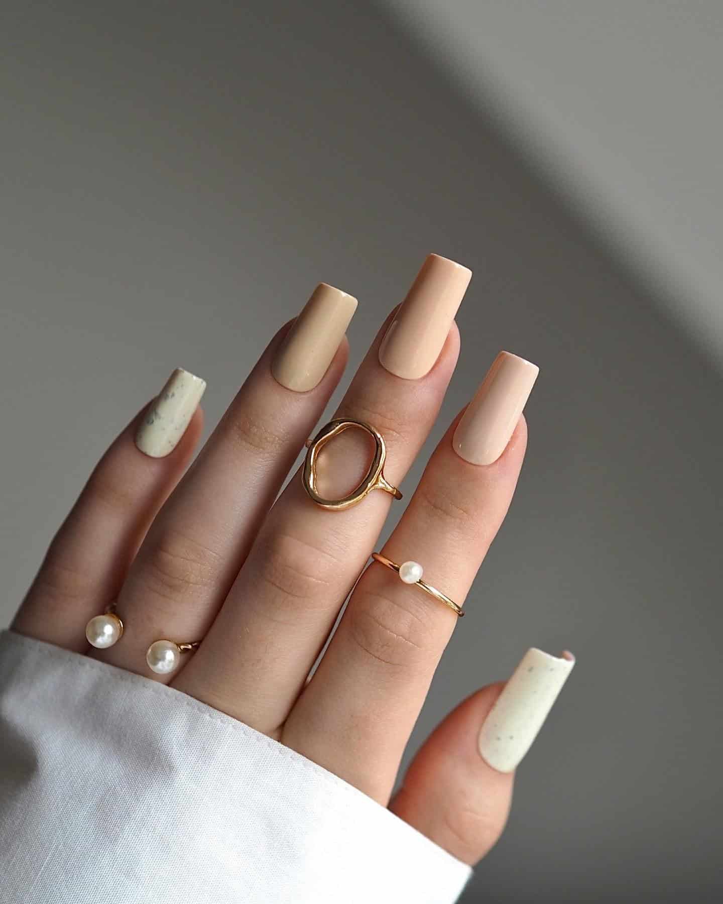 9. Neutral Beige Glossy Coffin Nails - elegant nail ideas