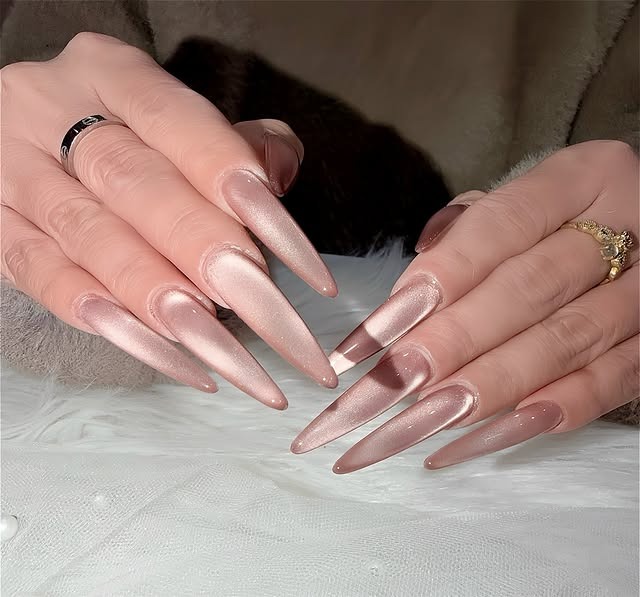 16. Rose Gold Chrome Stiletto Nails - elegant nail ideas