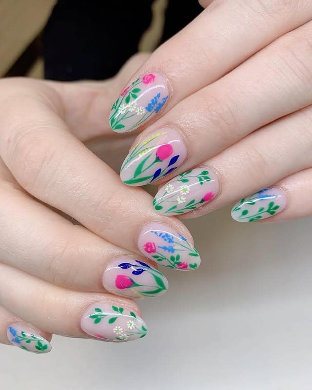 2. Botanical Garden Nails with Soft Pink and Bright Floral Accents - floral nail ideas