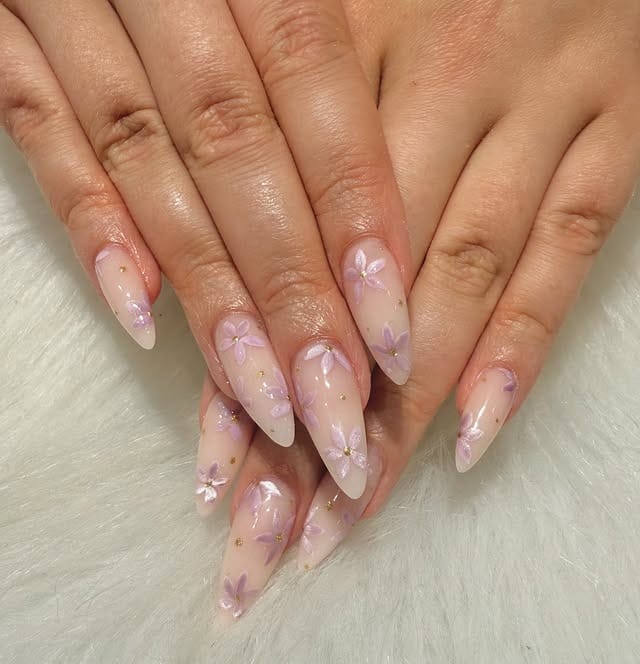 13. Pastel Yellow French Tip Nails with Blue Floral Art - floral nail ideas