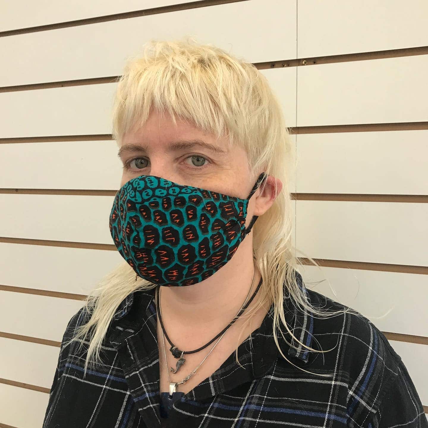 7. Platinum Blonde Wolf-Inspired Shag Mullet - Choppy Shaggy Haircuts
