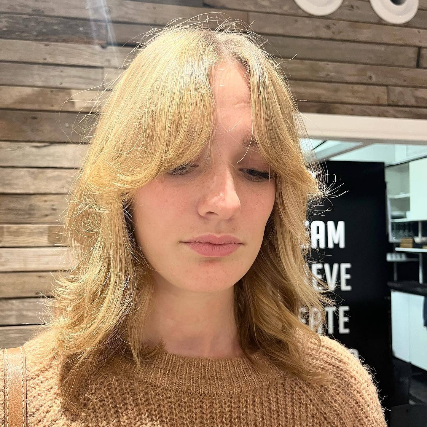 17. Golden Blonde Feathered Choppy Shag - Choppy Shaggy Haircuts