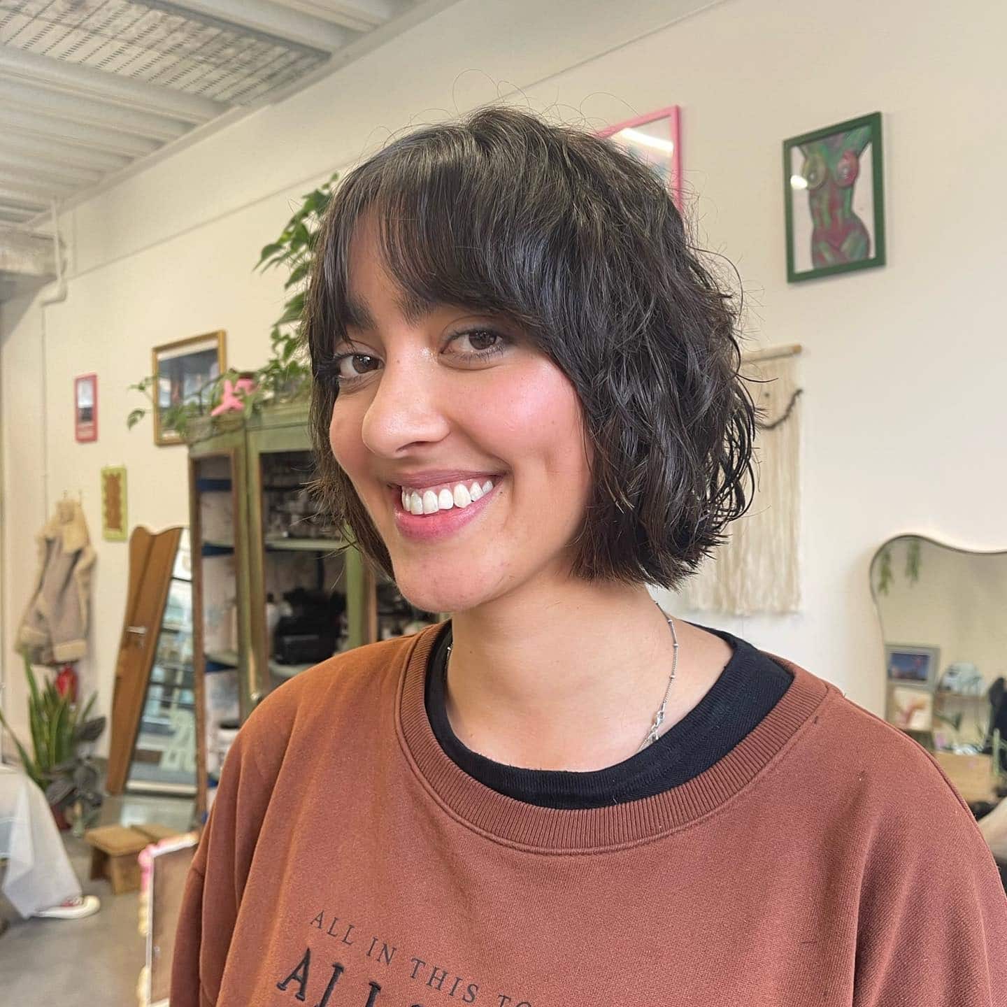 13. Soft Black Wavy Shaggy Bob with Curtain Bangs - Shaggy Bob Haircuts