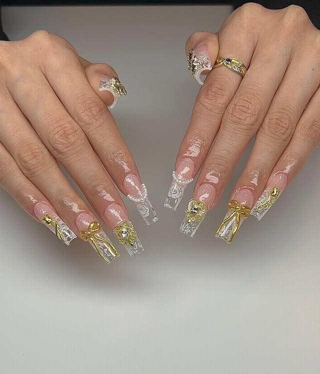 9. White Lace and Gold Bow Coffin Nails - gold nail ideas