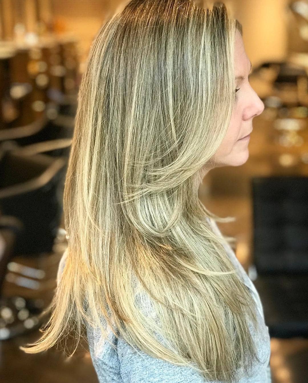 1. Long Feathered Layers with Beige Blonde Balayage - Long Wispy Haircuts