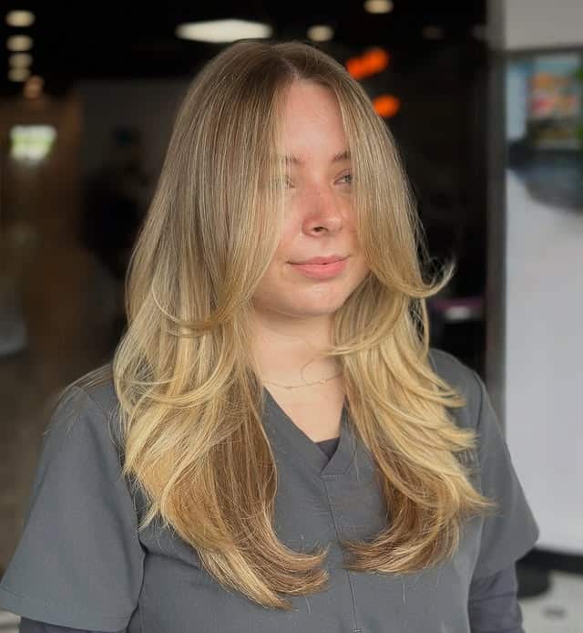 21. Long Feathered Layers with Vanilla Blonde Balayage - Long Wispy Haircuts