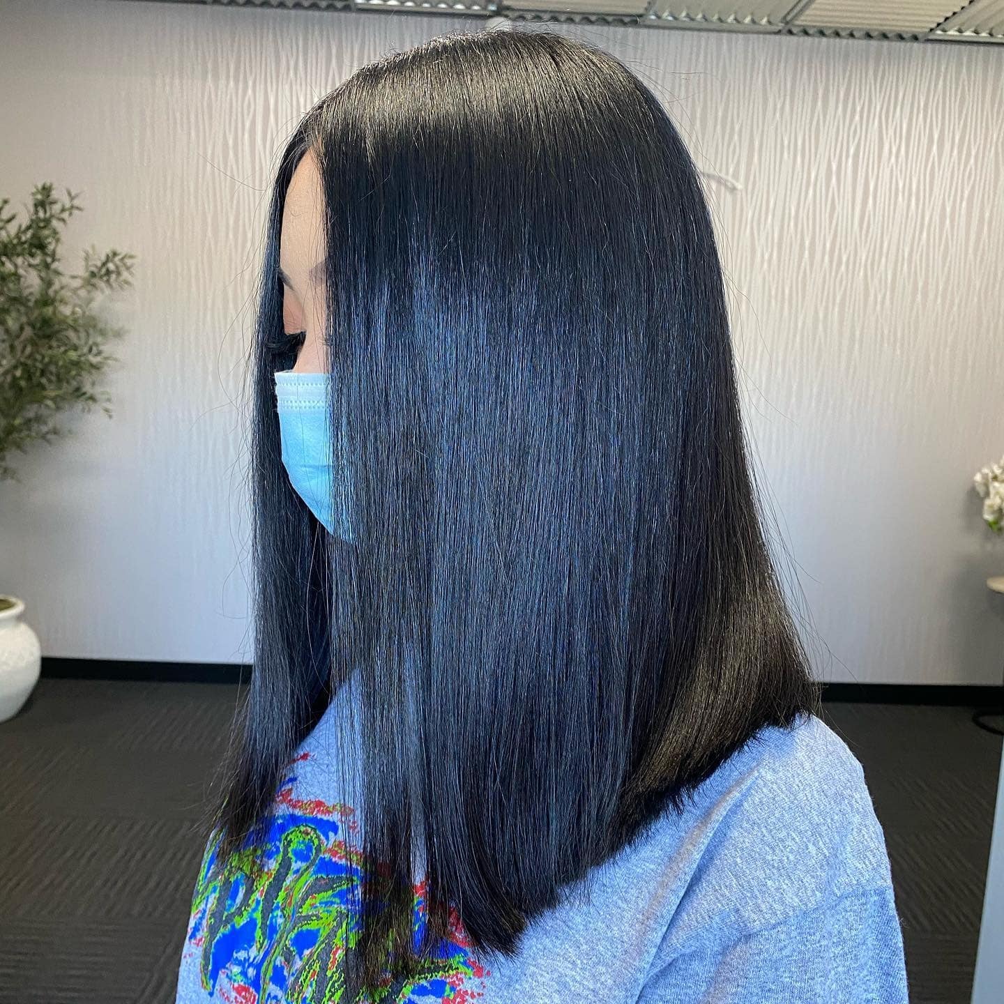 1. Sleek Jet Black Angled Lob - Angled Lob Haircut
