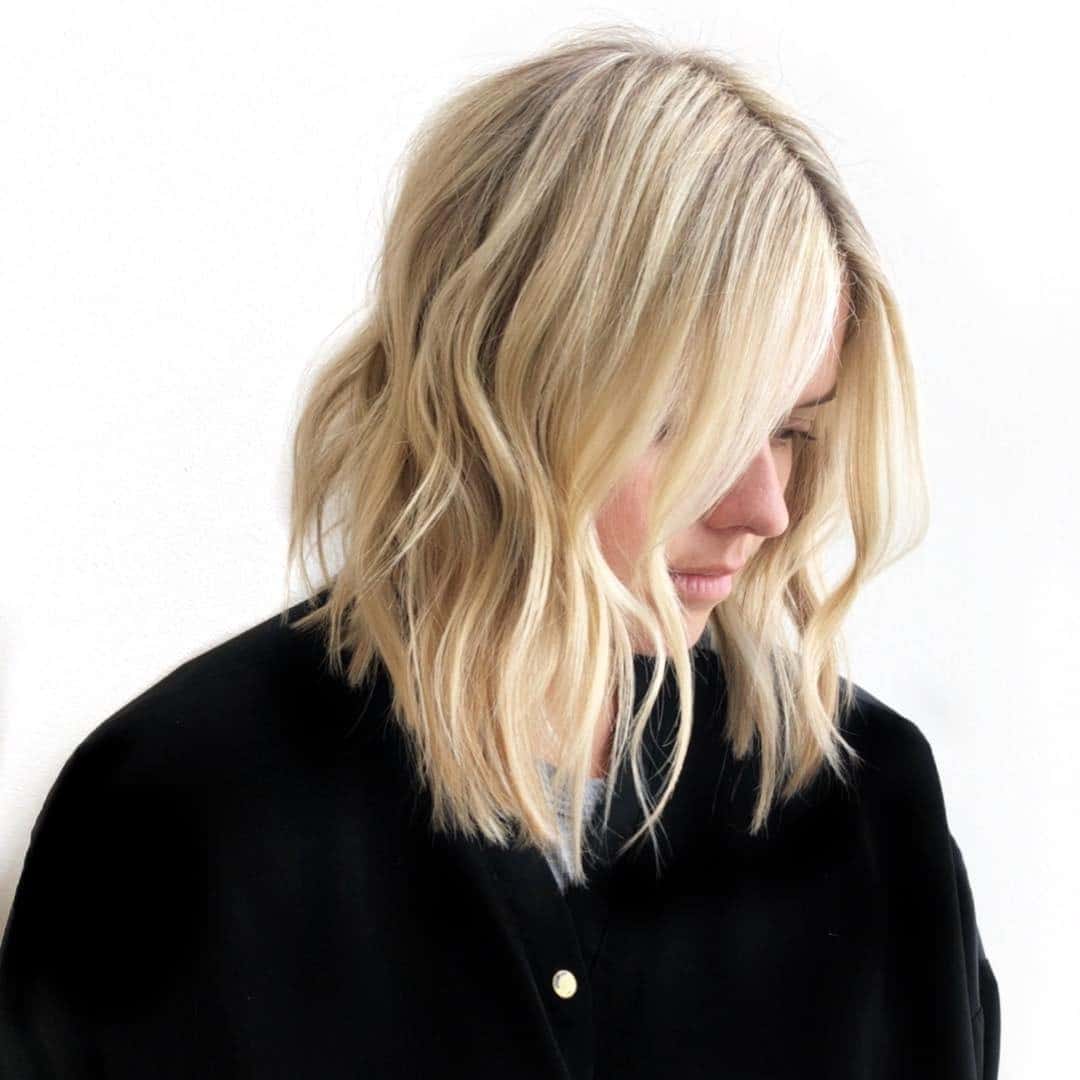 4. Textured Platinum Blonde Angled Lob - Angled Lob Haircut