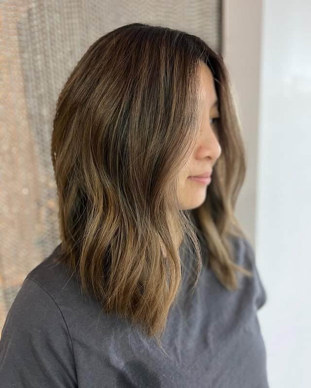 15. Smoky Brunette Angled Lob with Face-Framing Balayage - Angled Lob Haircut