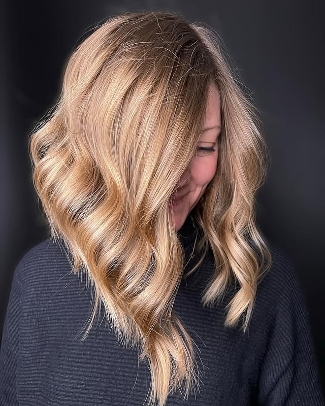 17. Layered Champagne Blonde Angled Lob - Angled Lob Haircut
