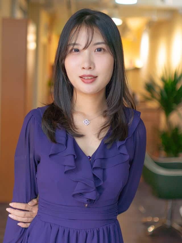 6. Medium Layered Cut with Natural Black Wispy Bangs - Layered Hair With Wispy Bangs