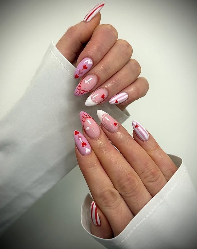 1. Pink and White Heart Bow Almond Nails - heart nail ideas
