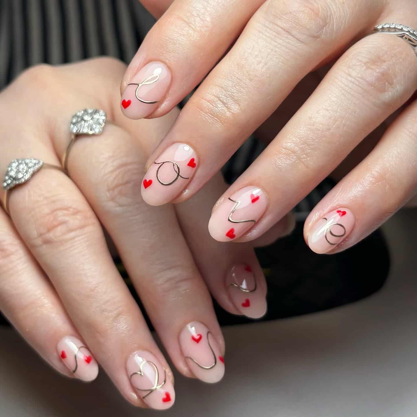 3. Nude Heart Outline Short Nails - heart nail ideas