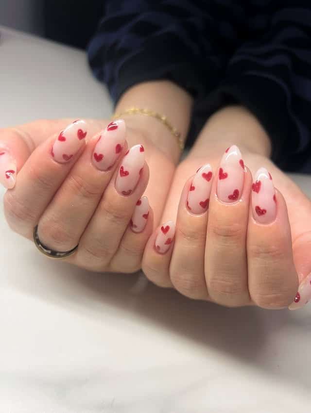 10. Sheer Pink Heart French Almond Nails - heart nail ideas