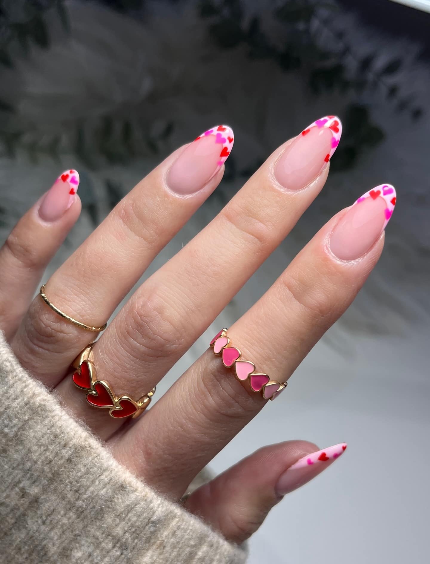 11. Pink Heart French Tip Almond Nails - heart nail ideas