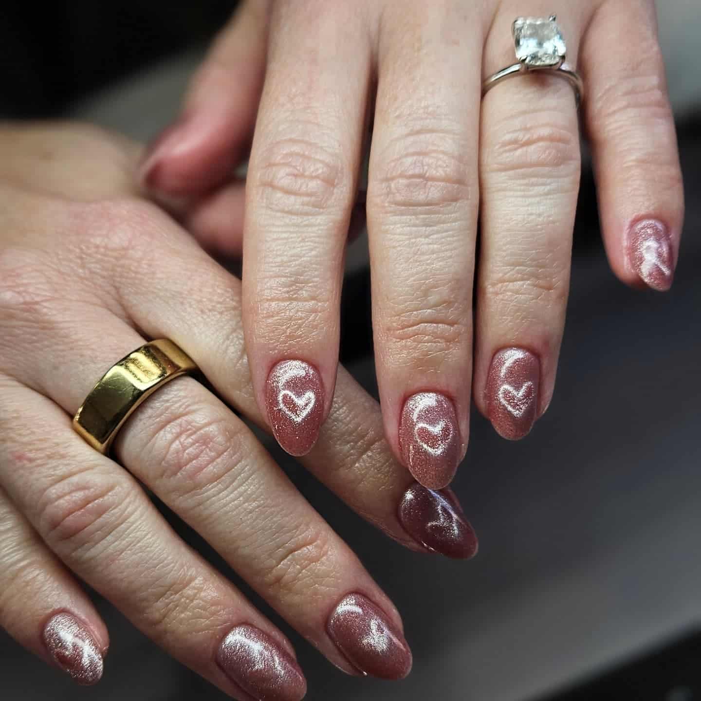 13. Rose Gold Cat Eye Heart Almond Nails - heart nail ideas