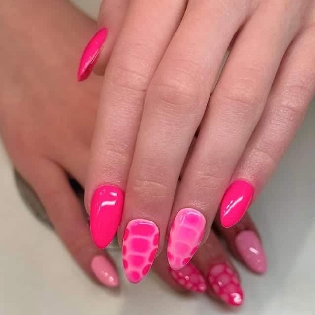 6. Bubblegum Pink Almond Nails with Abstract Accent Art - hot pink nail ideas