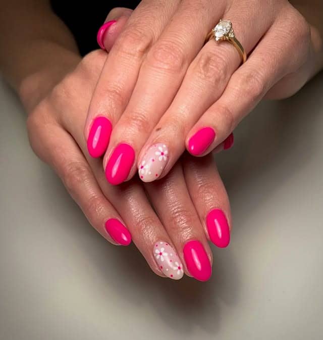 12. Neon Hot Pink Almond Nails with Confetti Accent Design - hot pink nail ideas