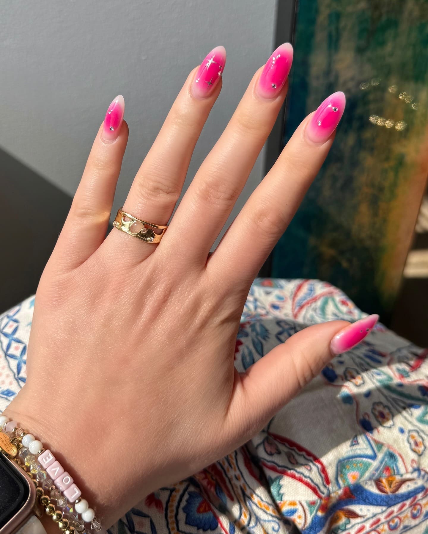 13. Pink Ombre Almond Nails with Crystal Accents - hot pink nail ideas
