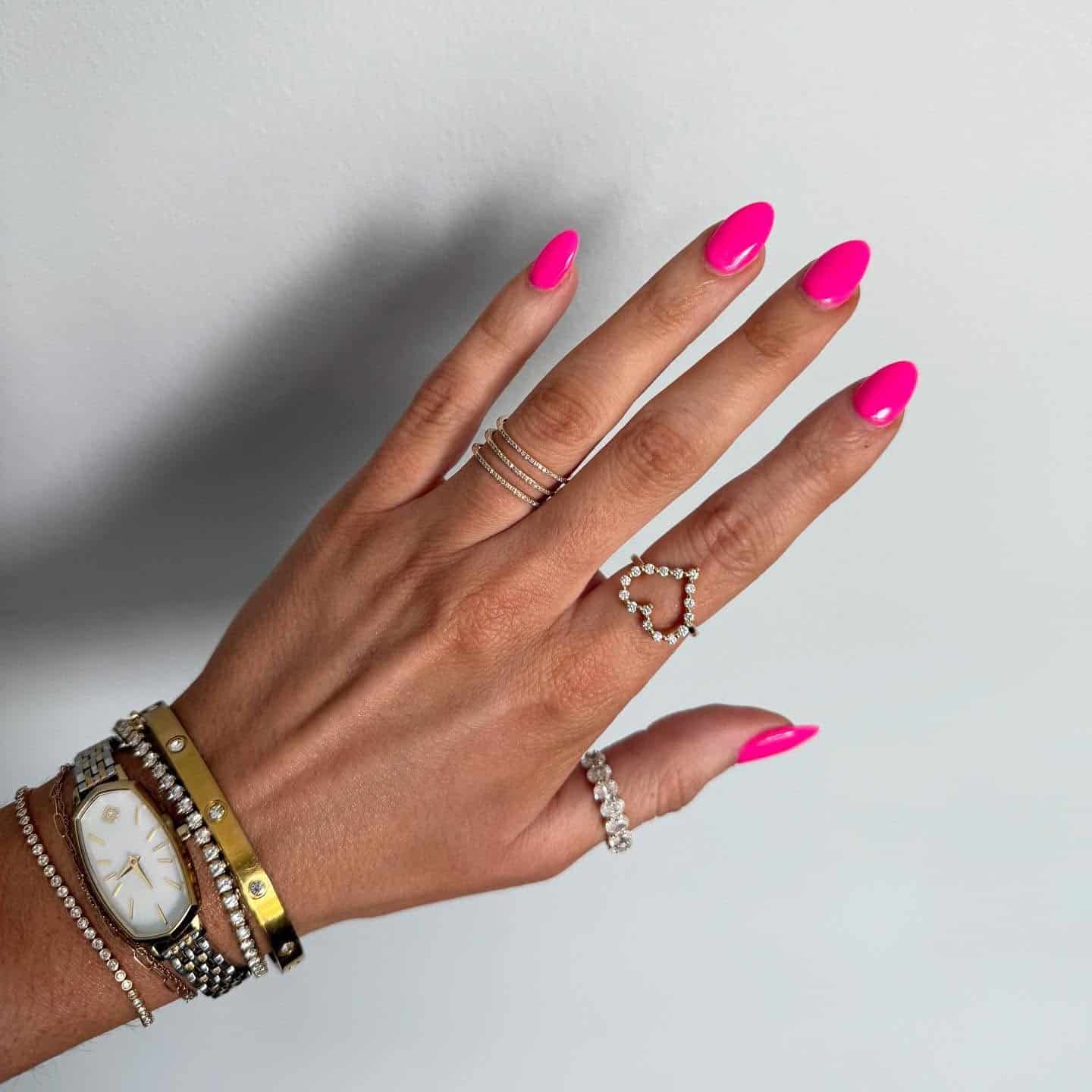 20. Vibrant Neon Pink Almond Nails - hot pink nail ideas