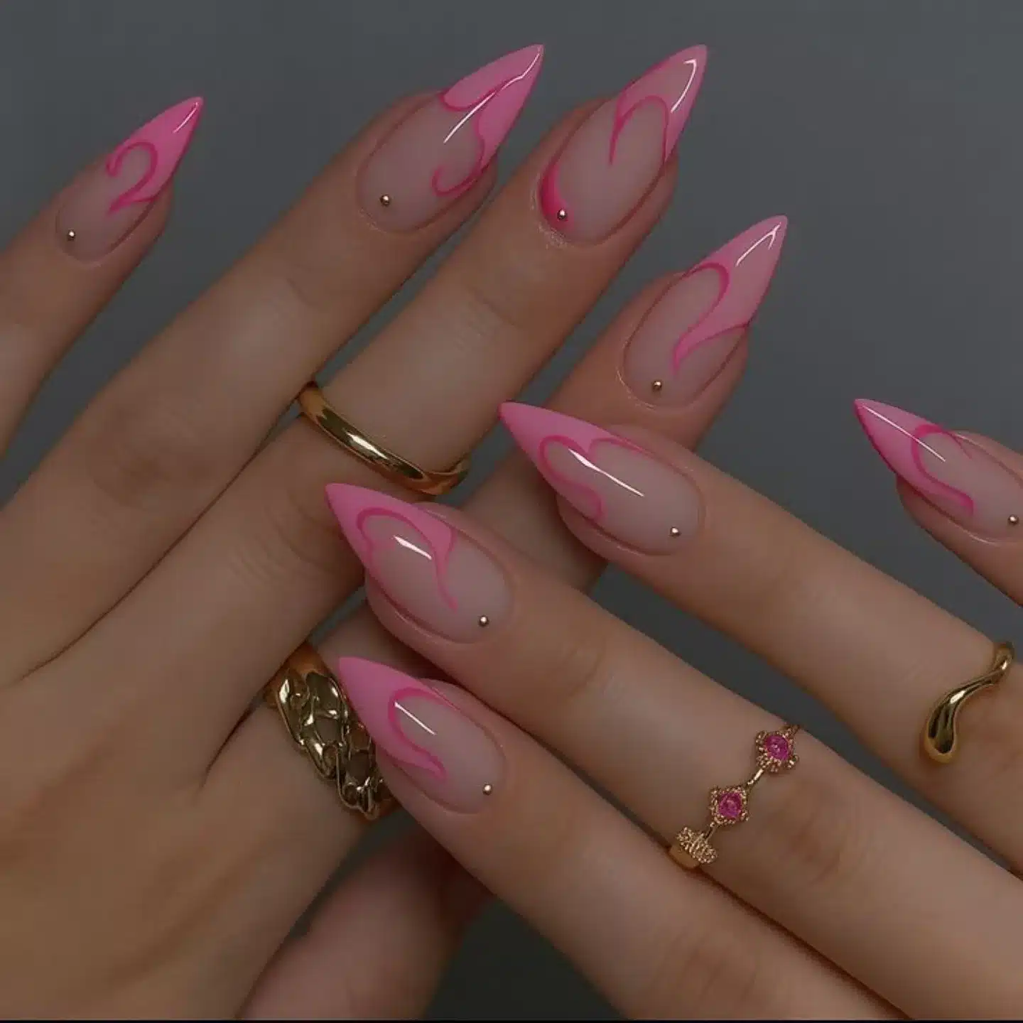 22. Soft Pink Swirl Stiletto Nails with Minimalist Art - hot pink nail ideas