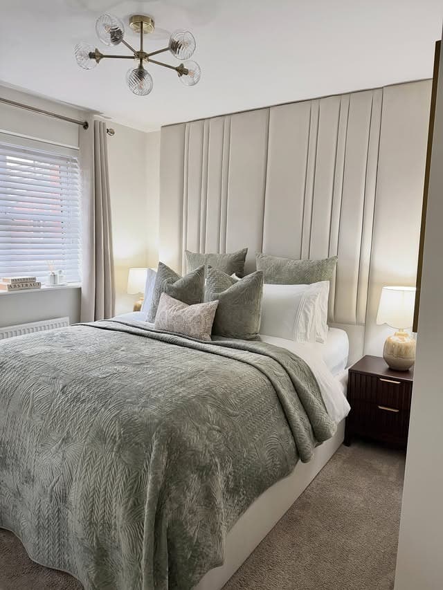 7. White and Gray Bedroom with Vertical Upholstered Wall Panels - white and gray bedroom ideas
