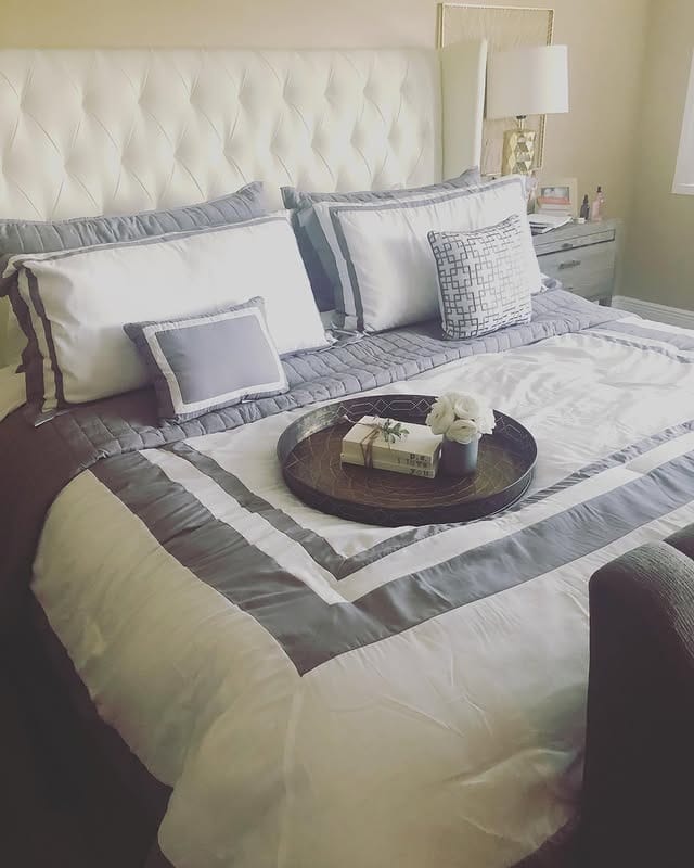 19. Luxury White and Gray Bedroom with Tailored Bedding - white and gray bedroom ideas