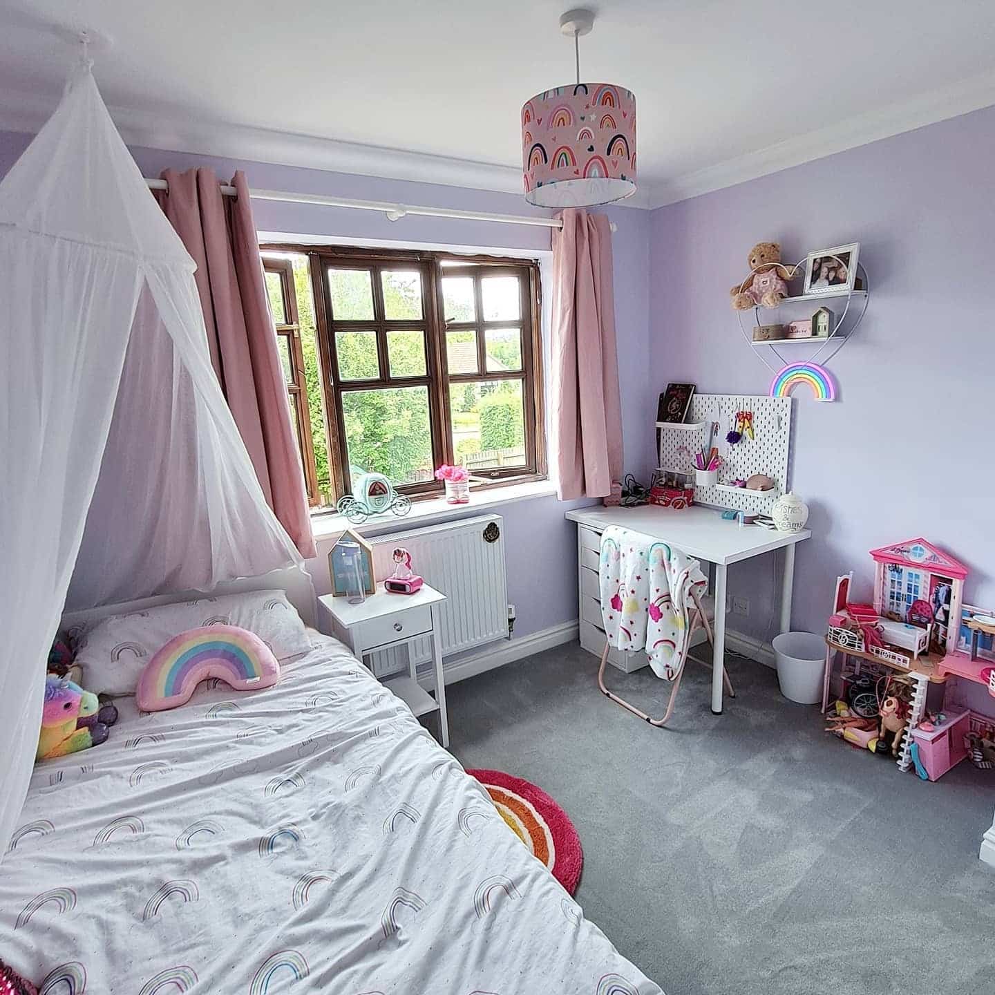 8. Soft Lilac Children's Bedroom with Rainbow Decor - pink and purple bedroom ideas