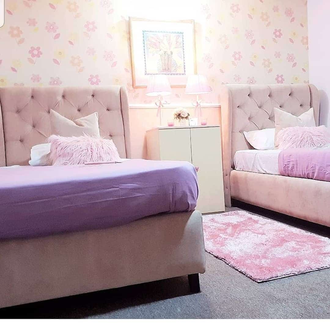 16. Pink and Lavender Twin Bedroom with Floral Wallpaper - pink and purple bedroom ideas