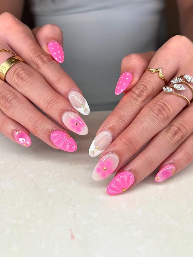 16. Bright Pink and White Floral Almond Nails - pink and white nail ideas