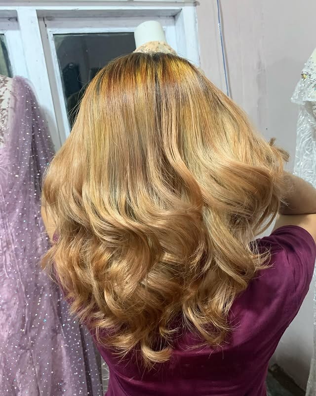 19. Golden Caramel Blonde Volume Curls - Golden Caramel Hair Color