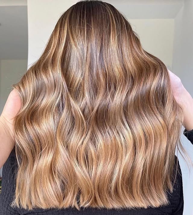 20. Dimensional Golden Caramel Brunette Waves - Golden Caramel Hair Color